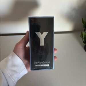 Yves Saint Laurent Fragrance with Black and Blue Packaging